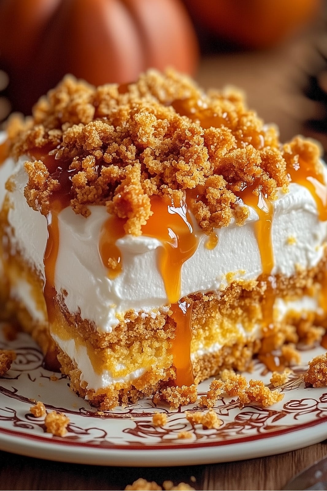 This Pumpkin Better Than Sex Cake is a decadent and indulgent dessert, perfect for fall gatherings or any time you want to impress your guests. With layers of moist pumpkin cake, sweetened condensed milk, fluffy Cool Whip, Heath bits, and a drizzle of caramel sauce, this cake is sure to be a hit!