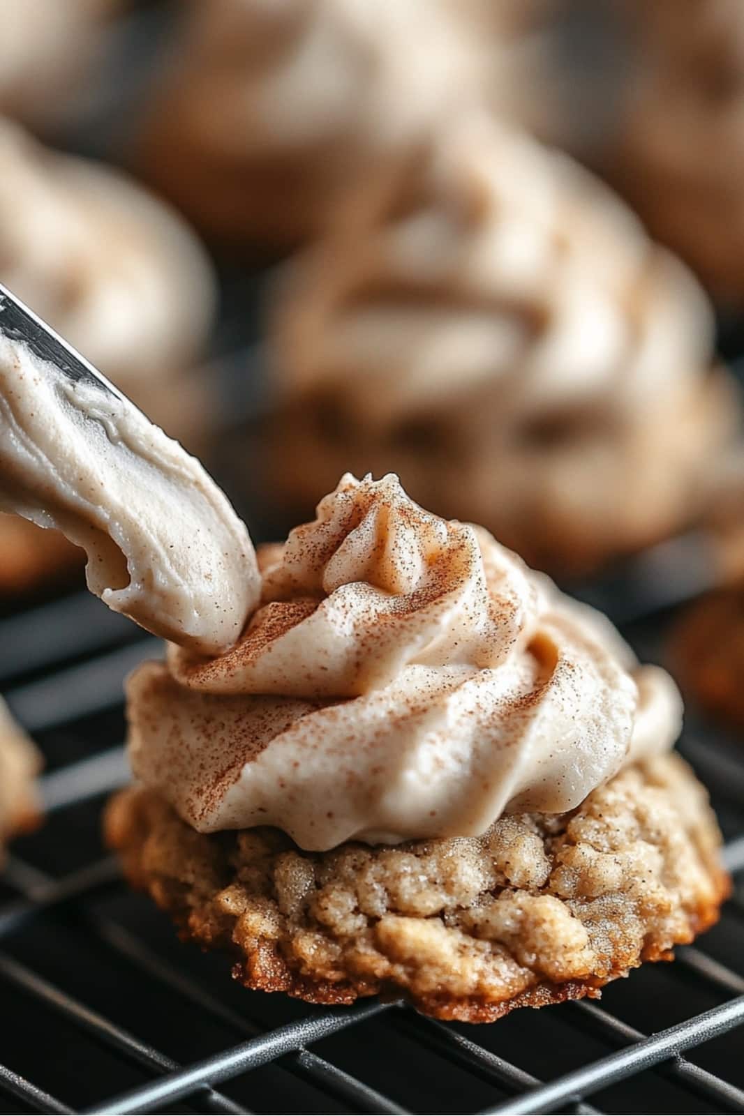 These Pumpkin Oatmeal Cookies with Cinnamon Cream Cheese Frosting are the perfect fall treat! Soft and spiced with pumpkin and oats, topped with a rich cinnamon frosting.