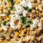 This Mexican Street Corn Pasta Salad is a zesty and flavorful fusion of pasta and elote flavors. With creamy Cotija cheese, fire-roasted corn, and a tangy lime dressing, this salad is the perfect side dish for summer barbecues or gatherings. It's easy to make, deliciously seasoned, and sure to be a crowd-pleaser.