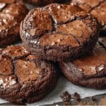 These Fudgy Brownie Cookies are the perfect combination of a rich, fudgy brownie and a soft, chewy cookie. With shiny, cracked tops and a gooey center, these cookies are a chocolate lover's dream!