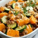 This Ground Turkey Sweet Potato Bake is a hearty and wholesome dish that combines savory ground turkey, tender sweet potatoes, and fresh zucchini, all topped with parmesan cheese for a flavorful, healthy meal. Perfect for weeknight dinners, it's nutritious, easy to prepare, and packed with flavor!