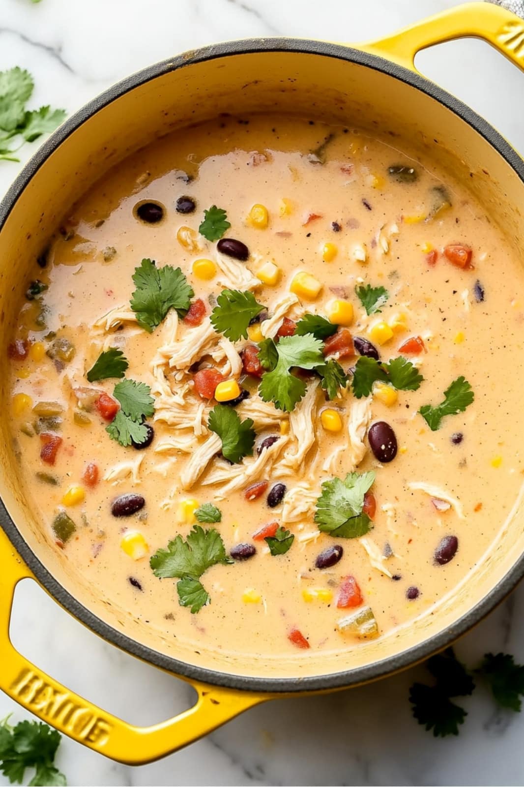 This Easy Chicken Taco Soup recipe is a creamy, flavorful meal ready in just 35 minutes! Made with rotisserie chicken, cream cheese, and simple pantry staples for a quick, hearty dish.