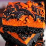 These Halloween Swirl Brownies are a spooky twist on classic brownies, featuring a rich dark chocolate base and vibrant orange cream cheese swirls. Perfect for Halloween parties! Ready in 45 minutes!