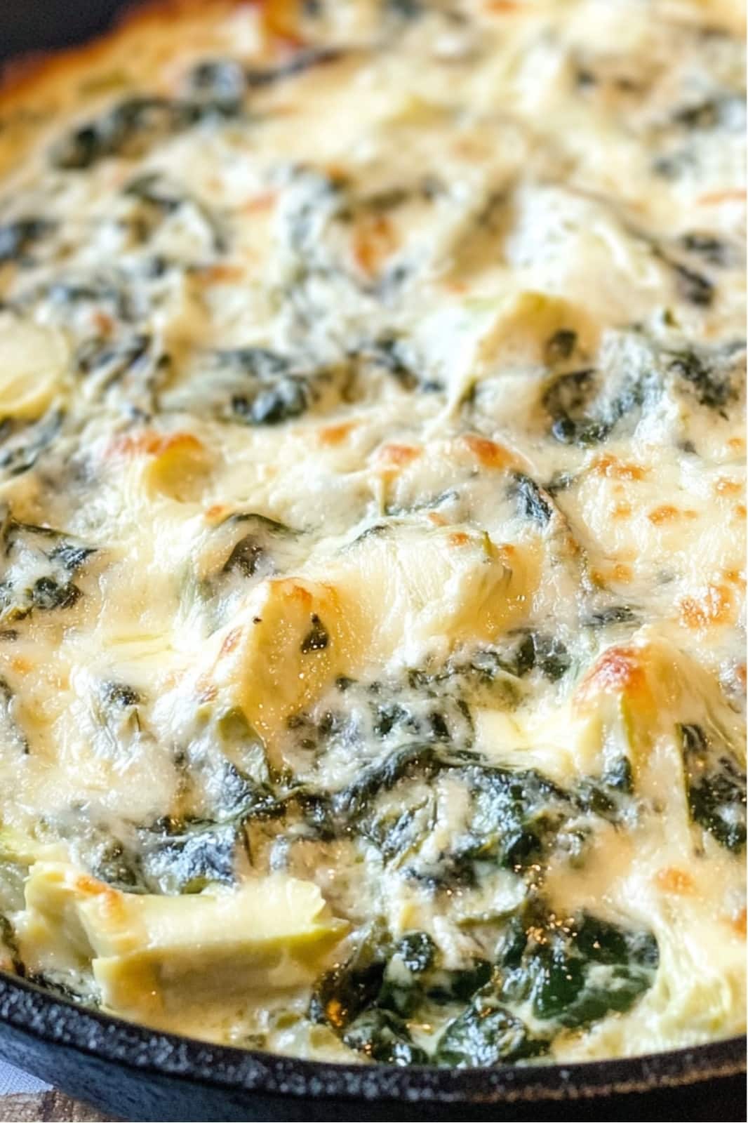 This Best Spinach Artichoke Dip recipe is creamy, cheesy, and perfect for any gathering! Made with spinach, artichokes, cream cheese, and mozzarella, it’s an easy, crowd-pleasing appetizer ready in 35 minutes.