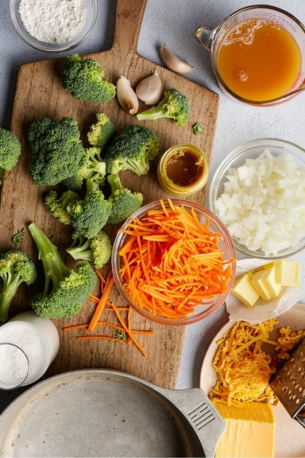 This Broccoli Cheddar Soup recipe is creamy, cheesy, and comforting! Made with broccoli, carrots, and cheddar, it's perfect for a quick and easy weeknight meal. Ready in 35 minutes!