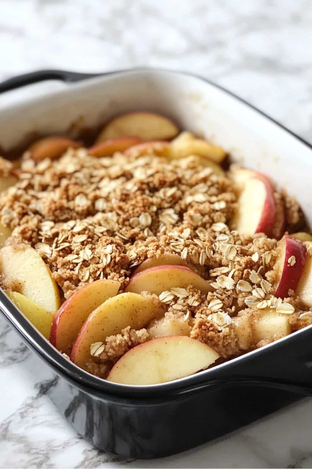 This Best Apple Crisp recipe is a cozy fall dessert with tender apples and a golden, crunchy oat topping. Serve it warm with ice cream for the ultimate treat! Ready in under an hour.