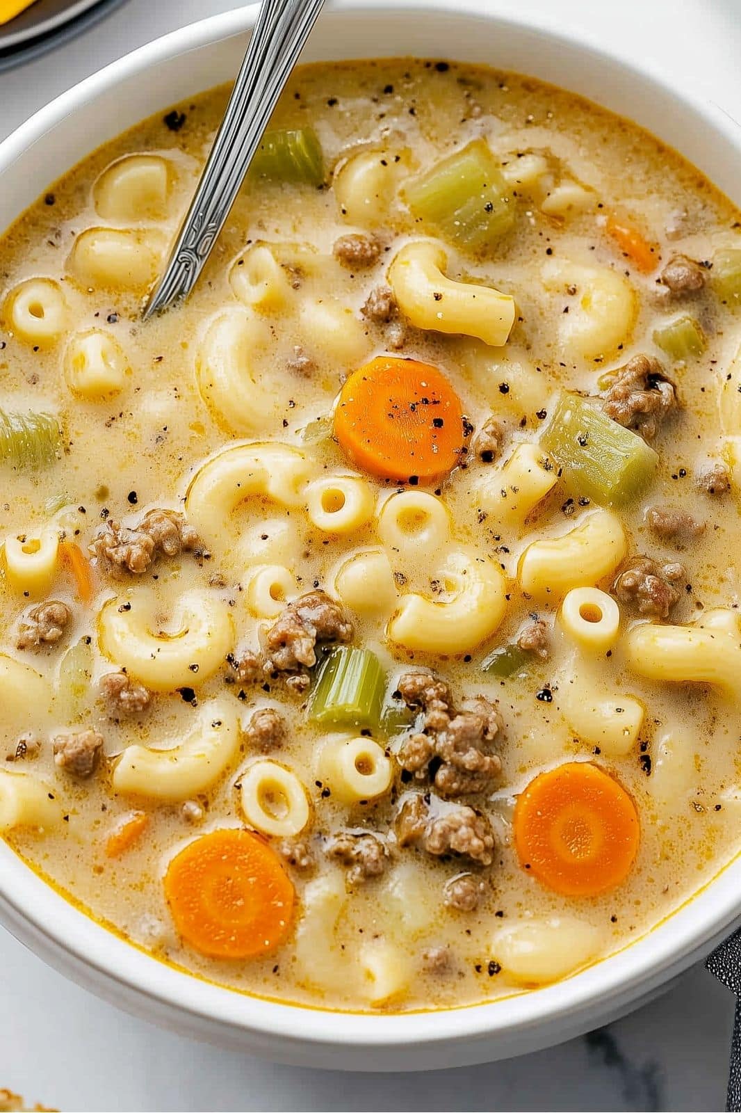 This One-Pot Macaroni Cheeseburger Soup is one of those go-to recipes when you want comfort food that’s easy to make. It’s basically a cheeseburger in a bowl with a little pasta thrown in for good measure. My family can never get enough of it, and let me tell you, it's perfect for chilly nights when you just want something warm and cheesy!