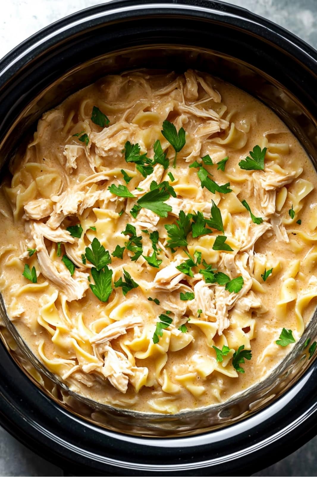 This Chicken & Noodles Crock Pot recipe is creamy and comforting! Made with tender chicken, egg noodles, and a rich broth, it's an easy slow cooker meal perfect for cozy dinners. Ready in 7 hours!