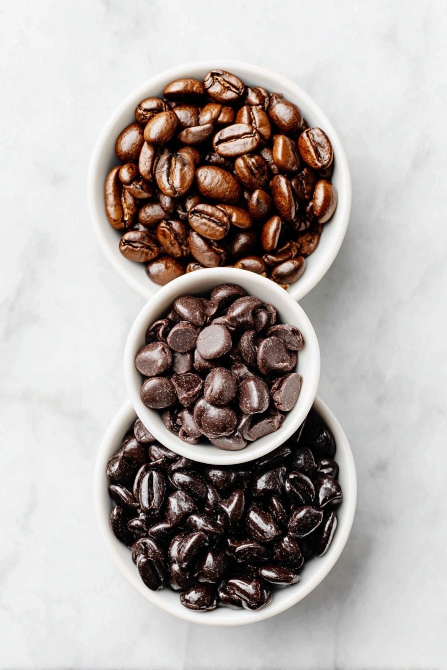 Chocolate Espresso Bean Bites Recipe 7 Flat lay of a small heap of glossy dark espresso beans, a small white ceramic bowl filled with rich semi-sweet chocolate chips, placed on a clean white marble surface, soft natural light, photo taken with an iPhone, professional food photography style, fresh ingredients, white ceramic bowls, no bottles, no duplicates, no utensils, no packaging --ar 2:3 --v 7 --p m7354615311229779997 - Chocolate Espresso Bean Bites, Chocolate Espresso Candy, Espresso Bean Snacks, Homemade Chocolate Espresso Treats, Easy Espresso Bites