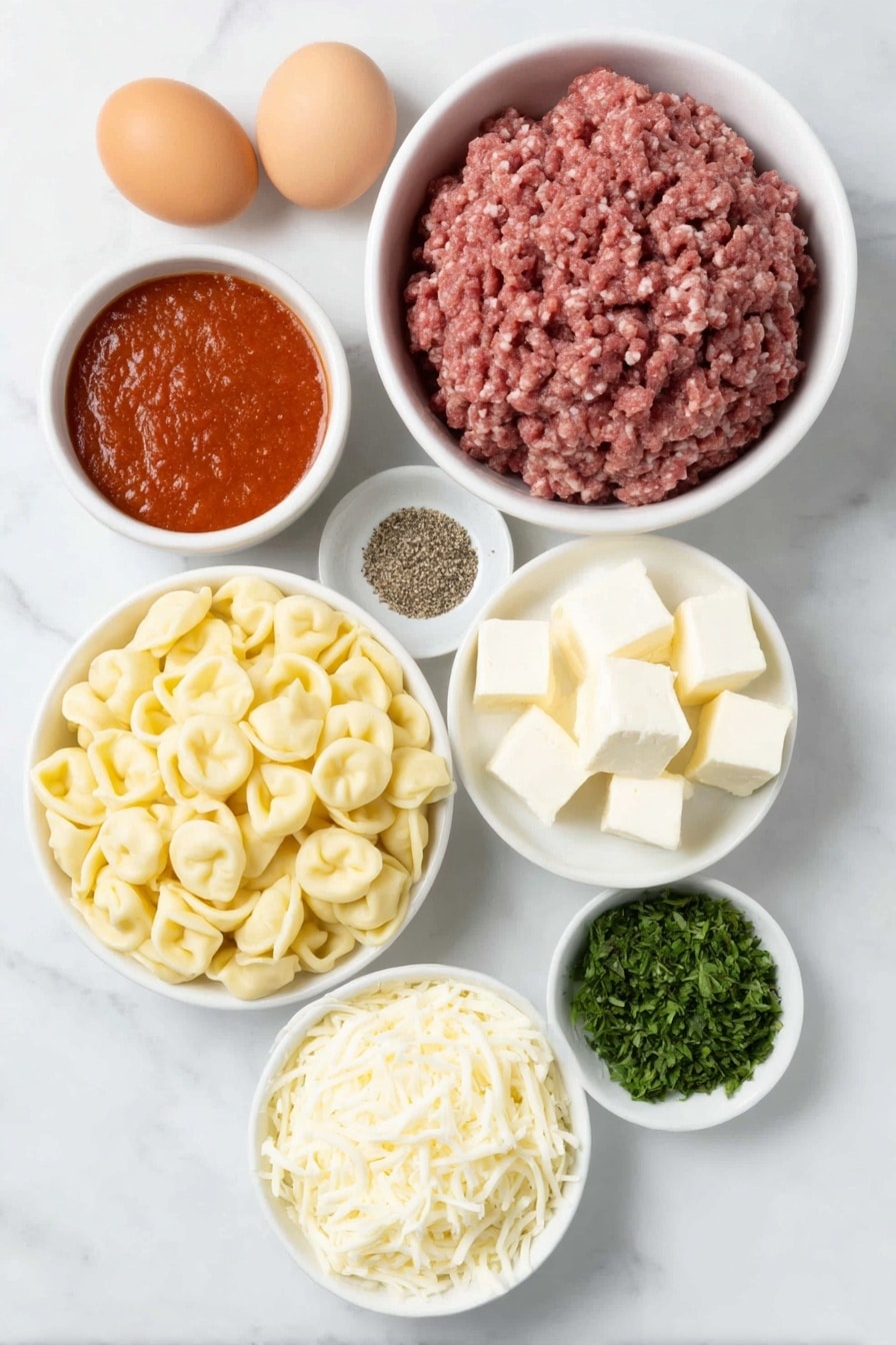 Cheesy Baked Tortellini Casserole with Meat Sauce Recipe 7 Flat lay of fresh cheese tortellini arranged in a small mound, a mound of raw ground beef with a bright red hue, a few cubes of creamy white cream cheese, a small white ceramic bowl filled with vibrant red tomato pasta sauce, a small white bowl heaped with shredded mozzarella cheese strands, a small white bowl with finely grated pale yellow parmesan cheese, a few fresh sprigs of green Italian seasoning herbs, a small white bowl of mixed coarse salt and black peppercorns, whole uncracked brown eggs placed symmetrically, all placed on a clean white marble surface, soft natural light, photo taken with an iPhone, professional food photography style, fresh ingredients, white ceramic bowls, no bottles, no duplicates, no utensils, no packaging --ar 2:3 --v 7 --p m7354615311229779997 - Cheesy Baked Tortellini with Meat Sauce, baked tortellini casserole, cheesy tortellini recipe, meat sauce pasta bake, hearty comfort food