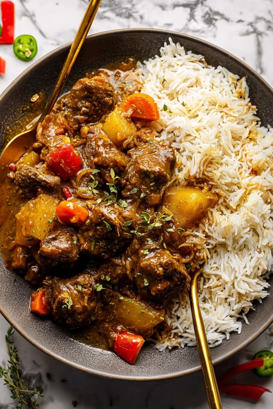 Jamaican Curry Chicken Recipe 8 A round white plate sits on a white marbled surface, filled with two main layers. The bottom layer is a bed of fluffy white rice with soft, separate grains. On top, there is a rich stew made of dark brown pieces of meat coated in thick sauce with visible chunks of yellow potatoes, orange carrots, and red pepper bits. The stew covers most of the rice, and the sauce has a shiny texture that makes the ingredients look moist and tender. Two gold-colored spoons rest inside the plate on opposite sides, slightly inserted into the rice and stew. Small green herb sprigs and green and red peppers are scattered around the plate on the background. Photo taken with an iphone --ar 2:3 --v 7 - Jamaican Curry Chicken, Caribbean chicken recipes, Jamaican cuisine, spicy curry chicken, coconut milk chicken dish