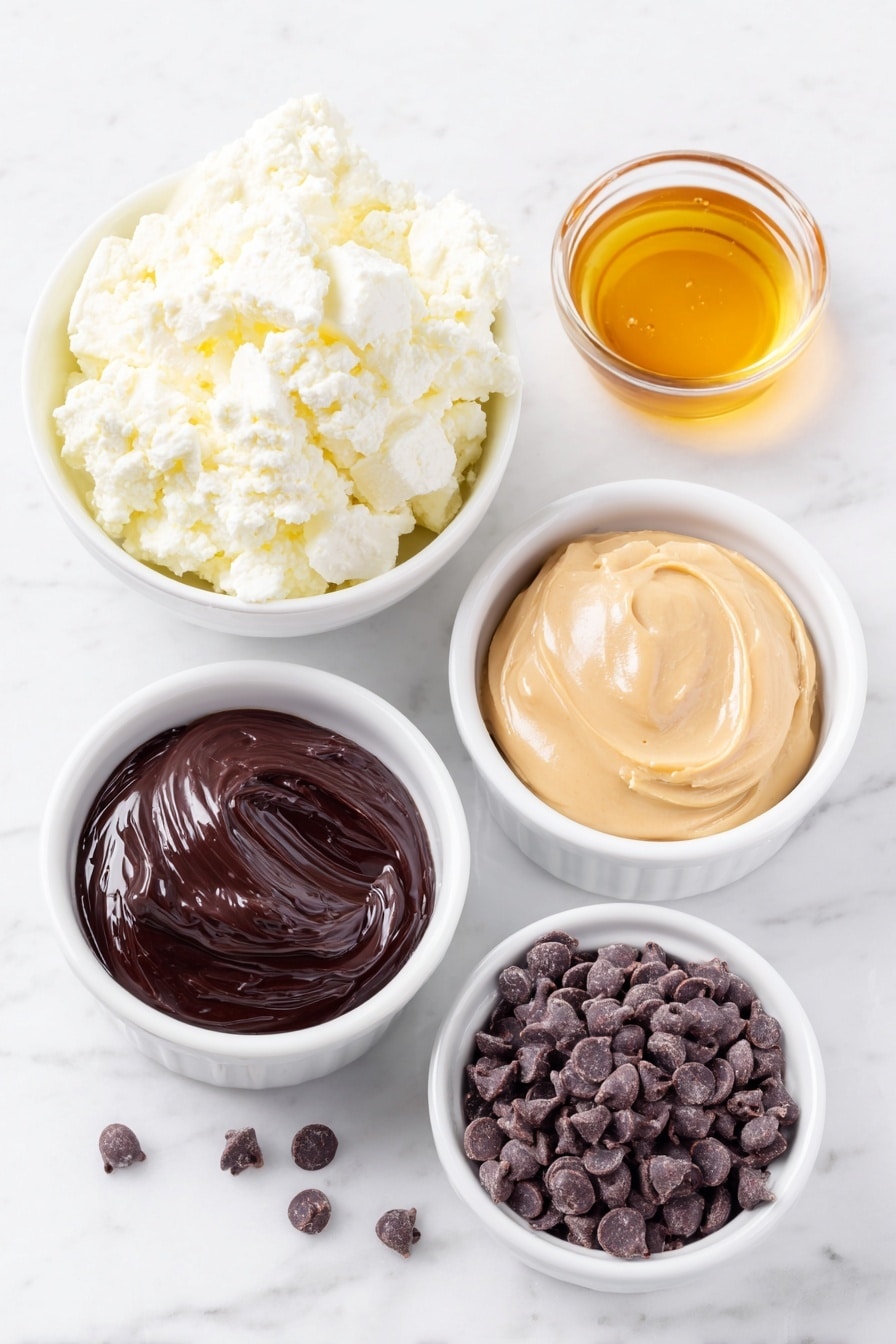 Creamy Cottage Cheese Ice Cream Recipe 7 Flat lay of a small mound of fresh full-fat cottage cheese, a small white ceramic bowl filled with golden honey, a small white ceramic bowl holding smooth creamy peanut butter, a small white ceramic bowl containing glossy dark chocolate chips, all arranged with perfect symmetry, placed on a clean white marble surface, soft natural light, photo taken with an iPhone, professional food photography style, fresh ingredients, white ceramic bowls, no bottles, no duplicates, no utensils, no packaging --ar 2:3 --v 7 --p m7354615311229779997 - Creamy Cottage Cheese Ice Cream, healthy cottage cheese ice cream, protein-packed frozen dessert, quick homemade ice cream, low-calorie cottage cheese treat
